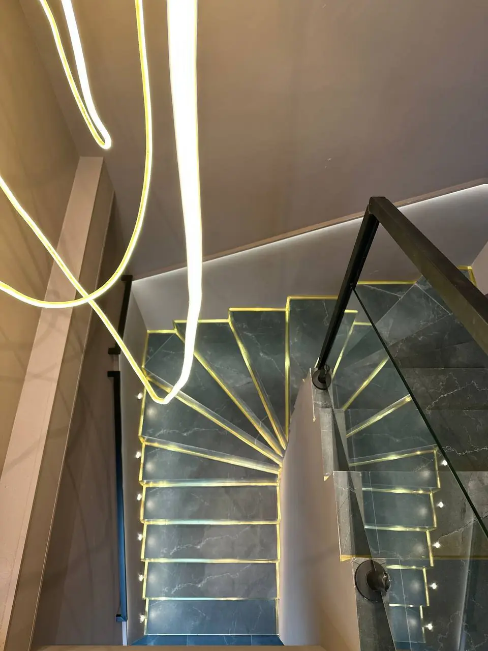 Illuminated staircase at Hide Clinic